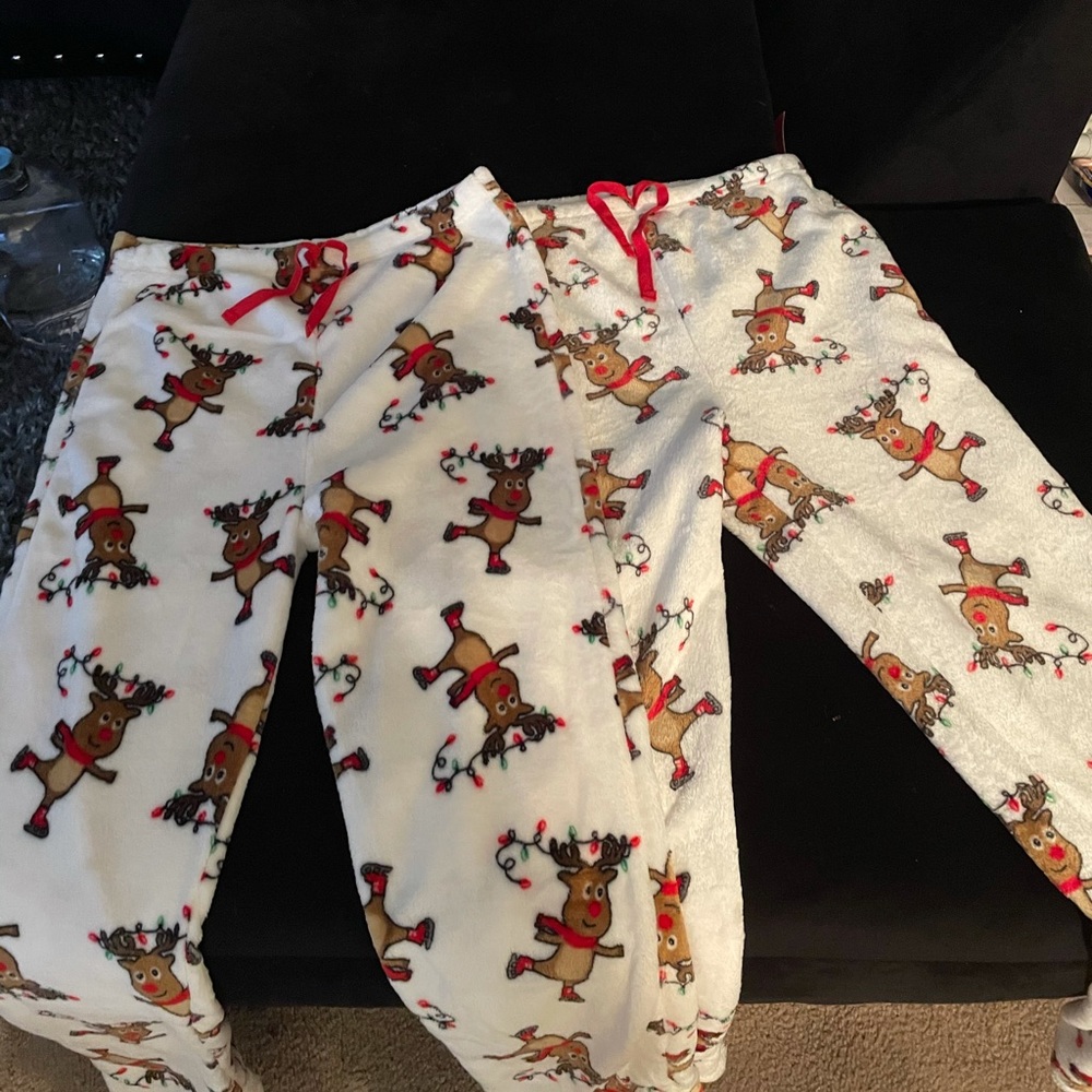 2 Christmas themed pajama pants. LARGE and XL